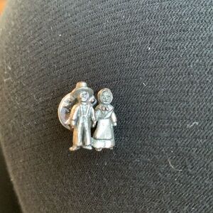 Vintage pewter prairie couple pin